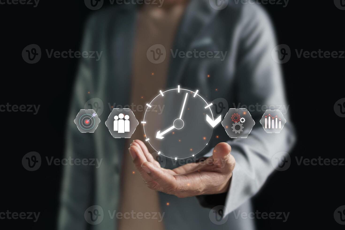 Time management concept to increase efficiency in personnel work, work as a team, can adjust time to be appropriate. A businessman holds out his hand with a virtual time icon in front of him. photo