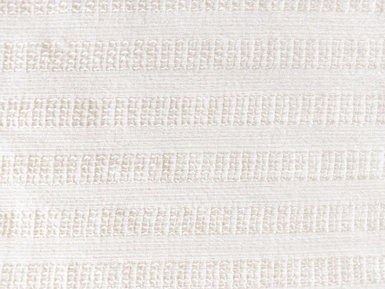 Light Colored Fabric with Vertical Loop Pattern Decorative Textile with Grid Like Stitch Detail photo