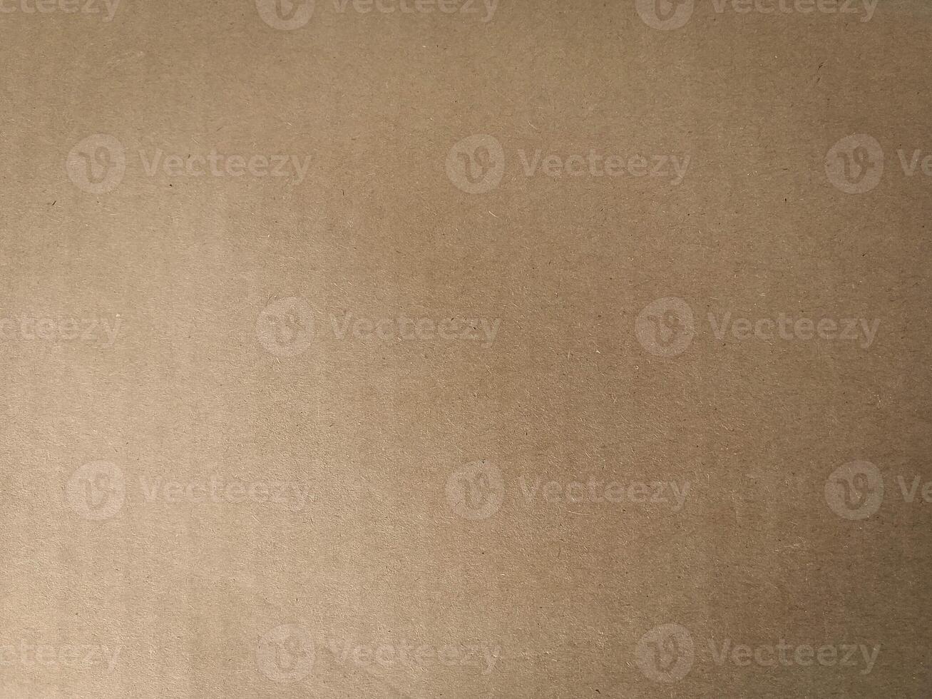 Plain Brown Cardboard Surface with Subtle Horizontal Texture Kraft Paper Background for Packaging and Design Use photo