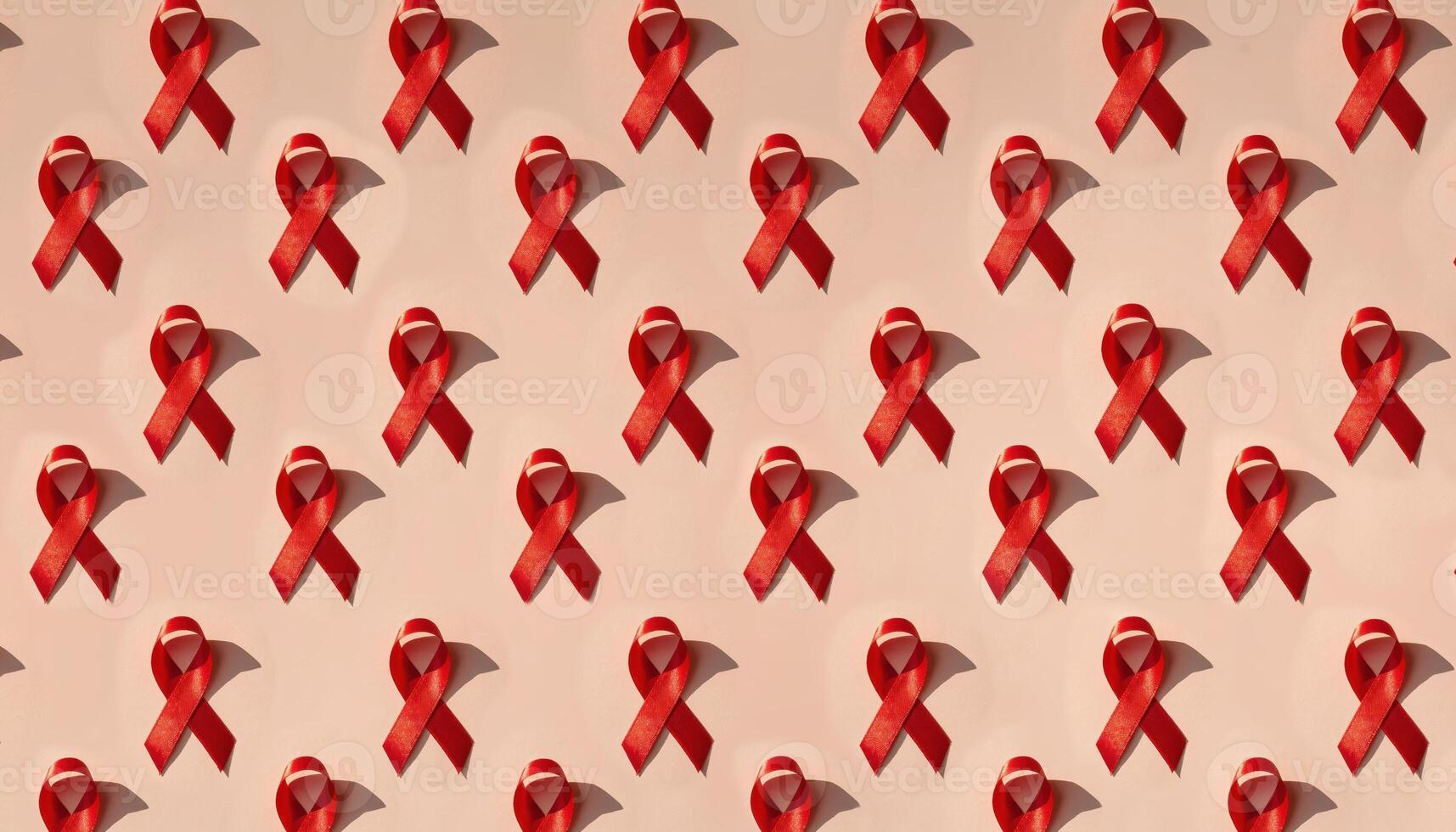 Pattern of Repeated Red Awareness Ribbons on Soft Peach Background for Campaign Visuals photo