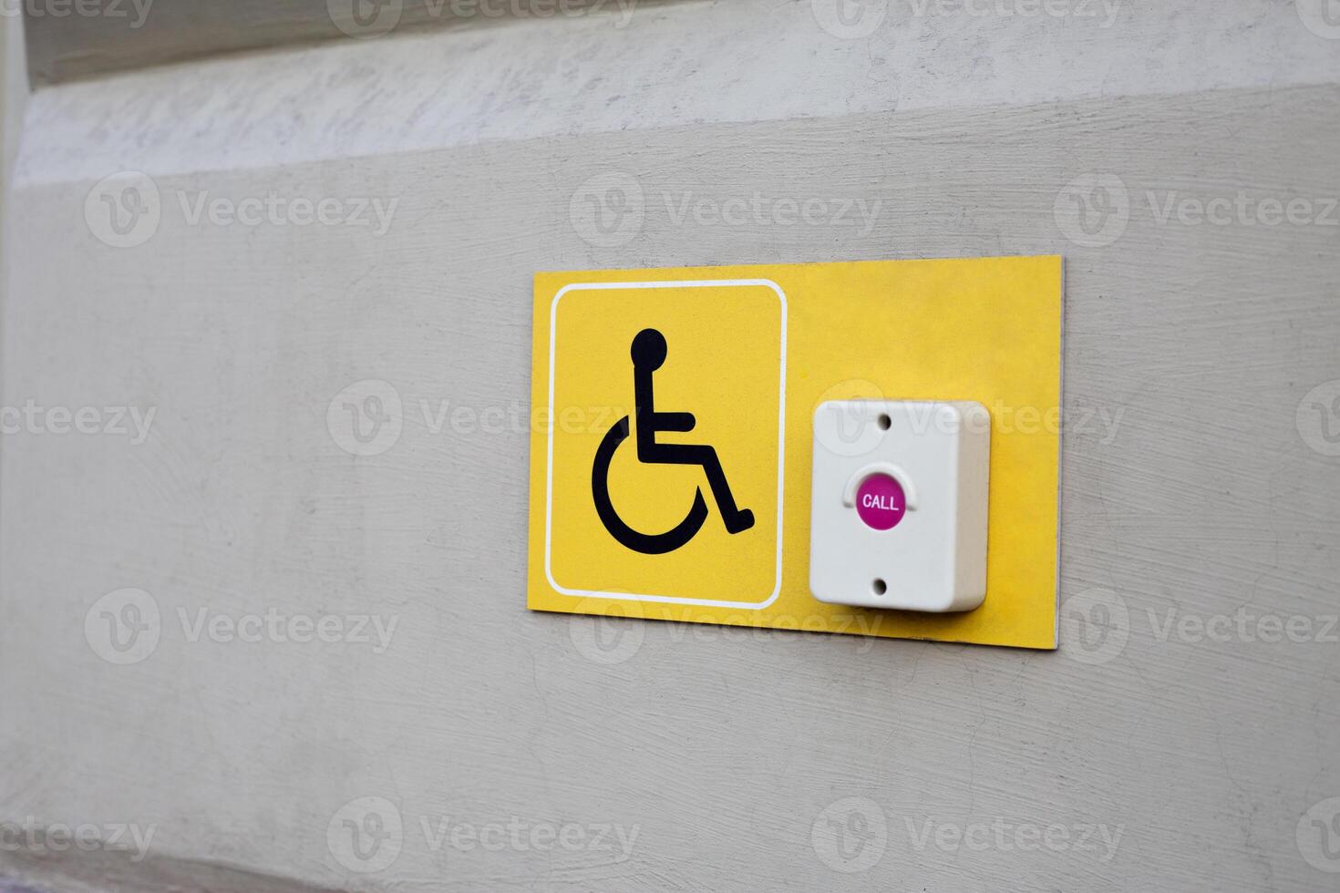 Wall with call button for people with disabilities. Concept for creating accessible areas for people with physical disabilities and mobility limitations. Assistance for people with injuries photo