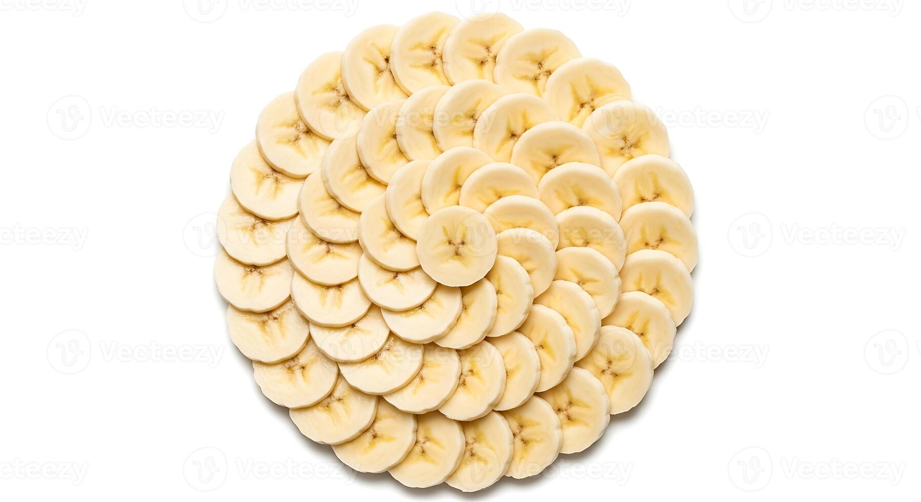 Fresh Banana Slices Arranged in a Circular Pattern on White Background photo