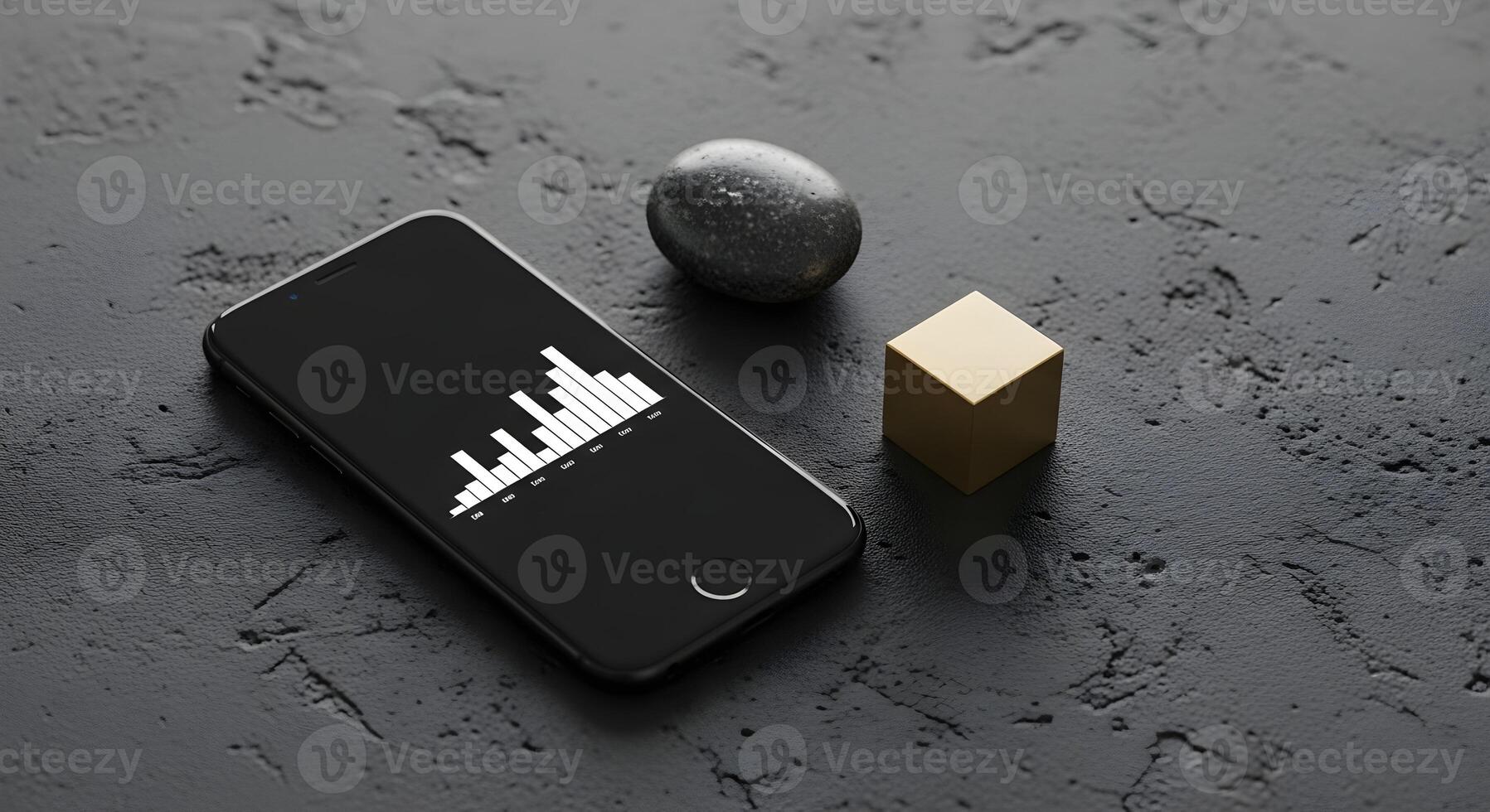 Minimalist modern workspace featuring smartphone with signal bars graphic stone and gold cube on textured black surface photo