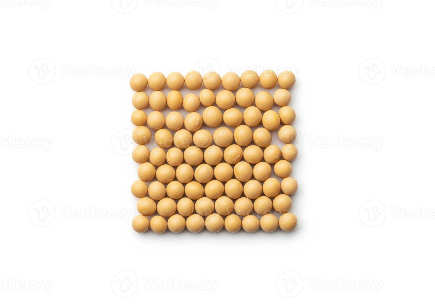 Perfectly arranged dry soybeans forming a precise square pattern photo
