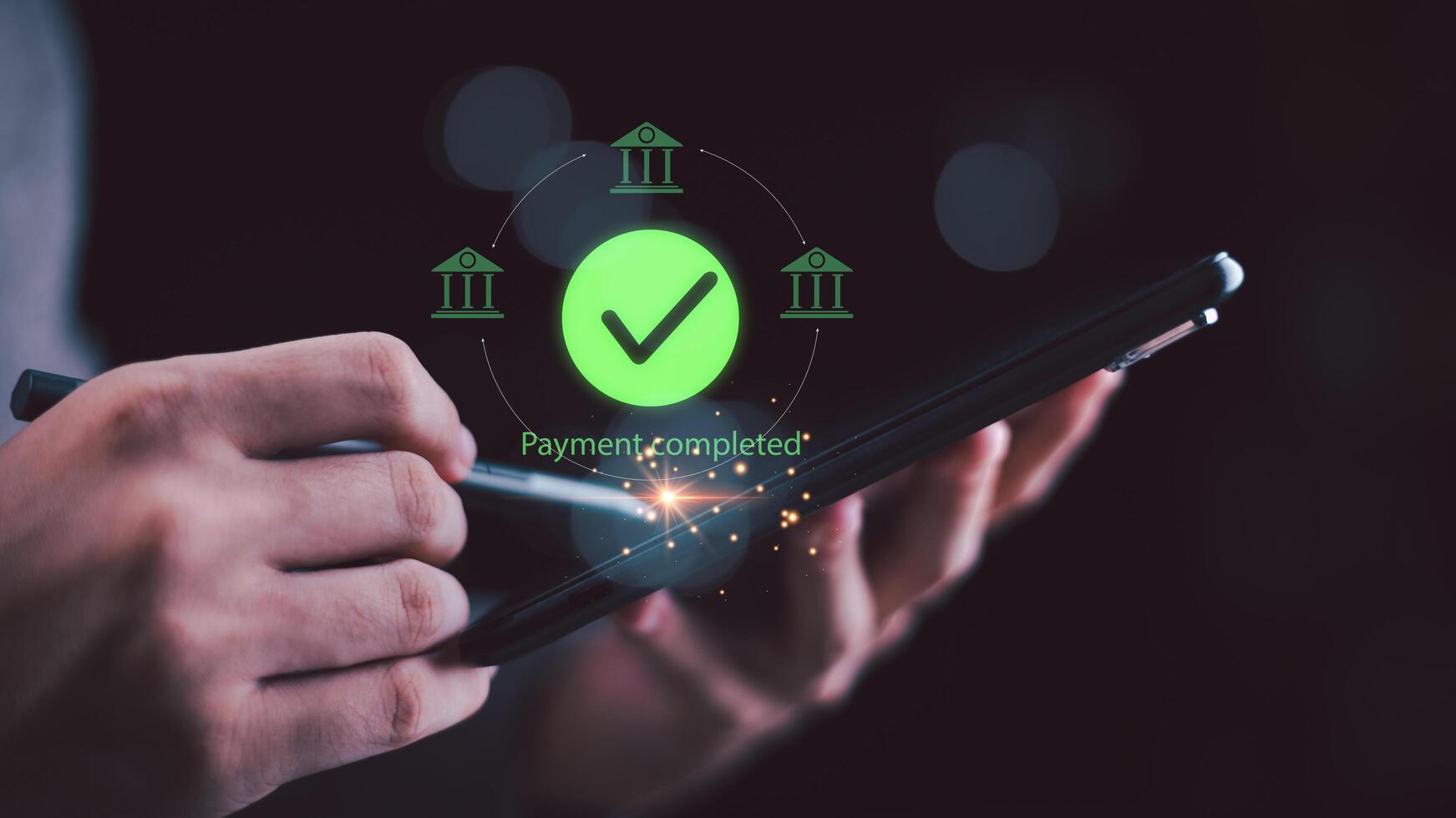 A person using a tablet with a glowing check mark and banking icons, representing secure online transaction, fintech innovation, mobile payment, and successful digital financial completion. photo
