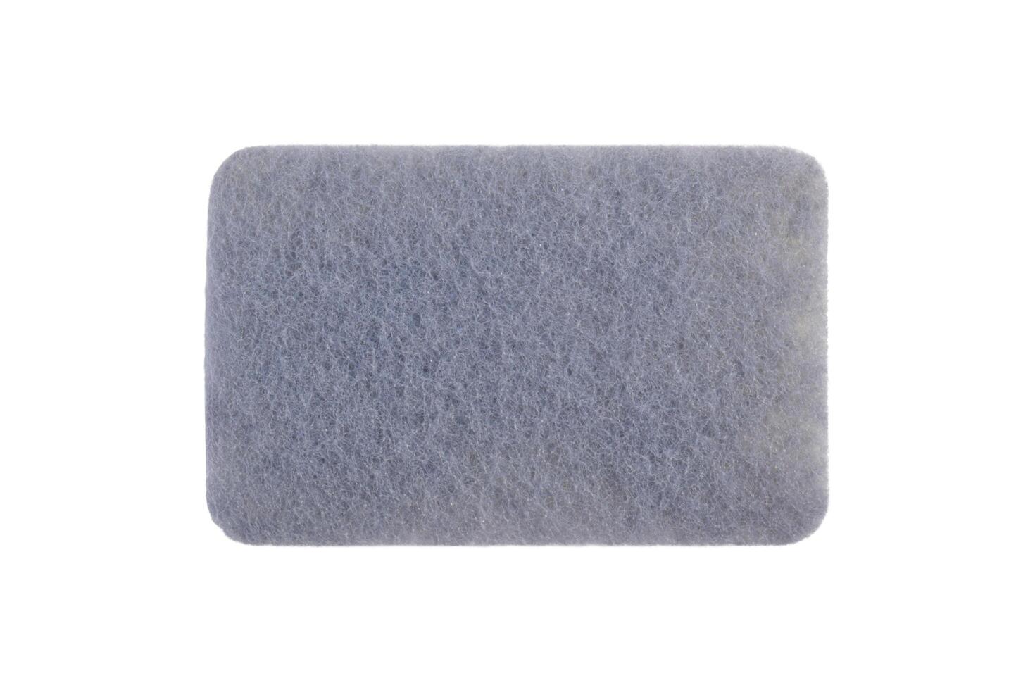 A soft, grey, rectangular bath mat with a subtle textured pattern, isolated on a white background. photo
