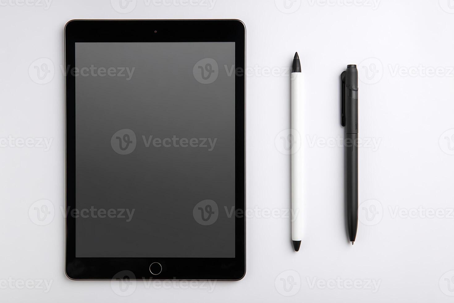 Tablet and stylus on white background with negative space creating a clean minimalist tech workspace scene photo