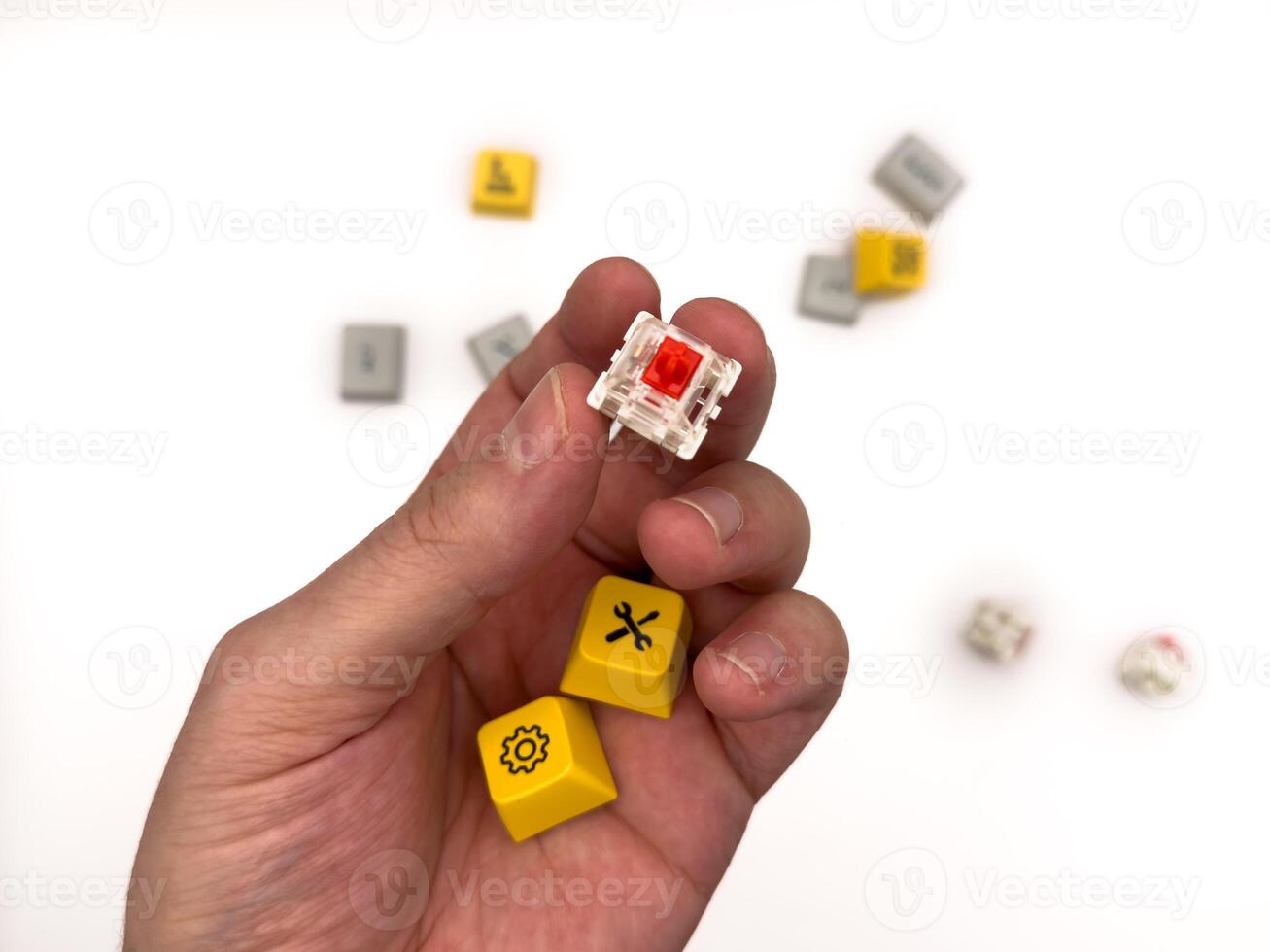 Closeup Red switches, Keyboard repair, broken keys, mechanical keyboard, red keycaps, IT, keyboard work, for advertising, white background, copy space photo