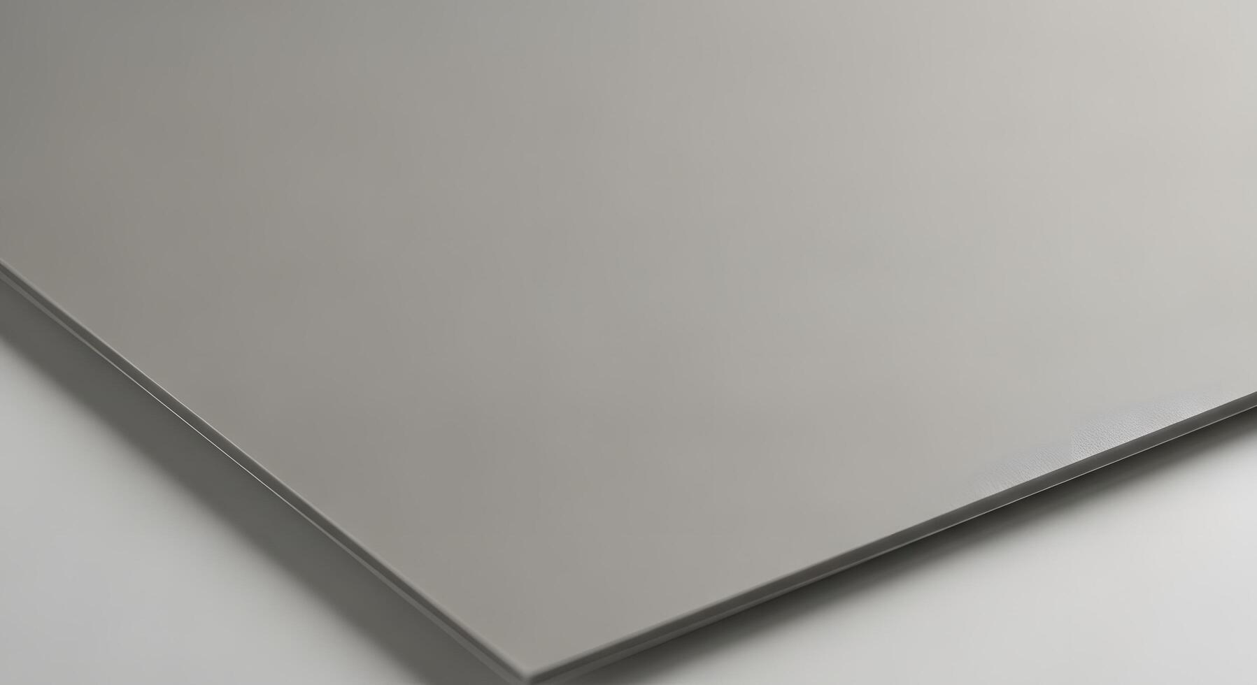 A minimalist abstract of a smooth, elegant grey surface displaying a subtle reflective sheen and refined texture, perfect for modern backgrounds, material concepts, and sophisticated design elements photo