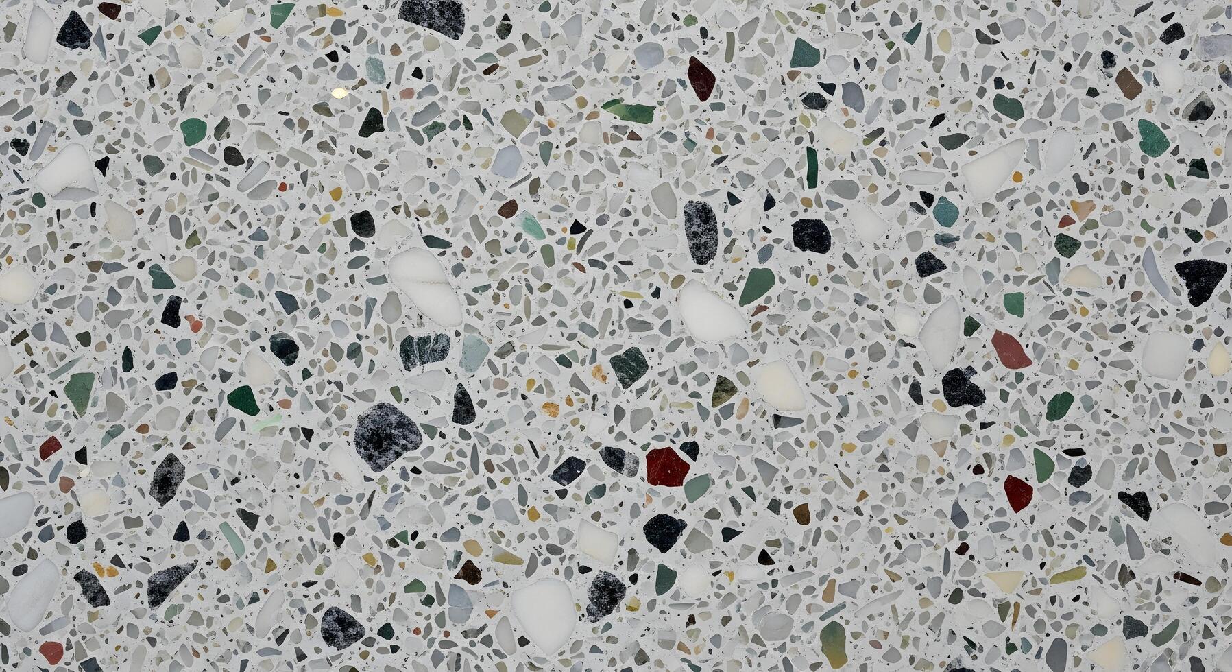 Abstract terrazzo pattern with a playful mix of colorful chips on a light gray background, offering a unique textural element photo