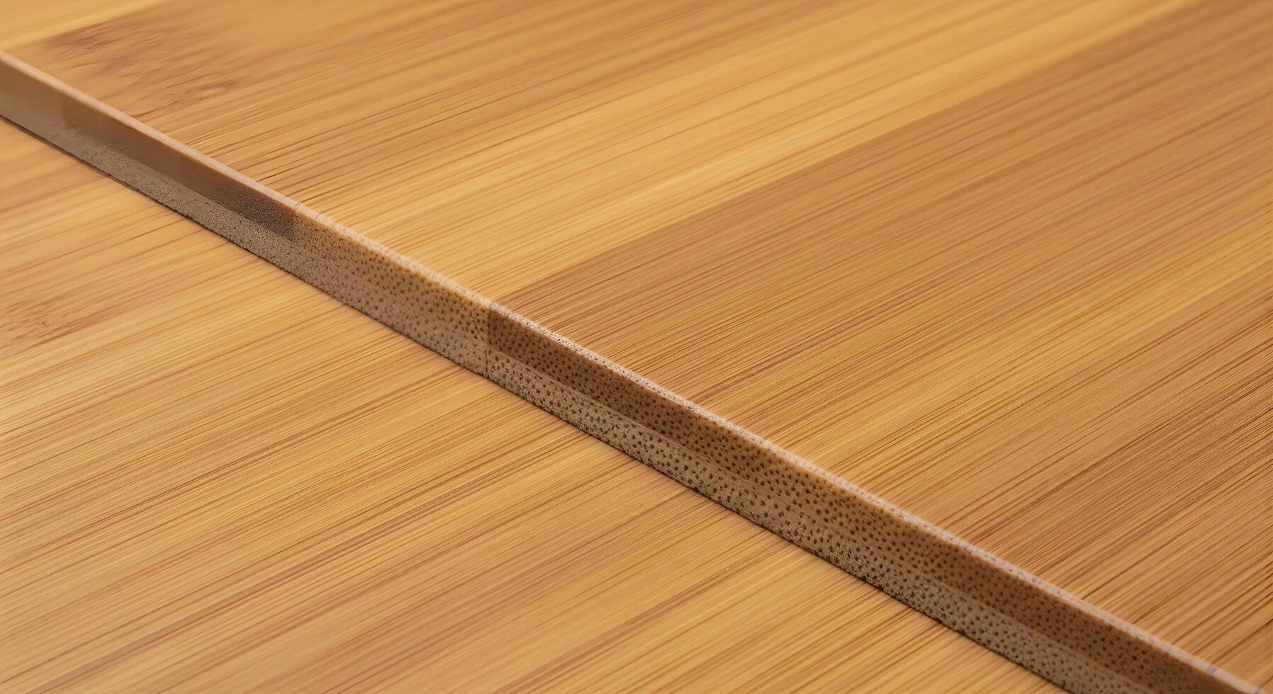Close-up of a seamless, natural bamboo wood texture with a visible grain pattern and a clean, light brown surface, perfect for background use photo