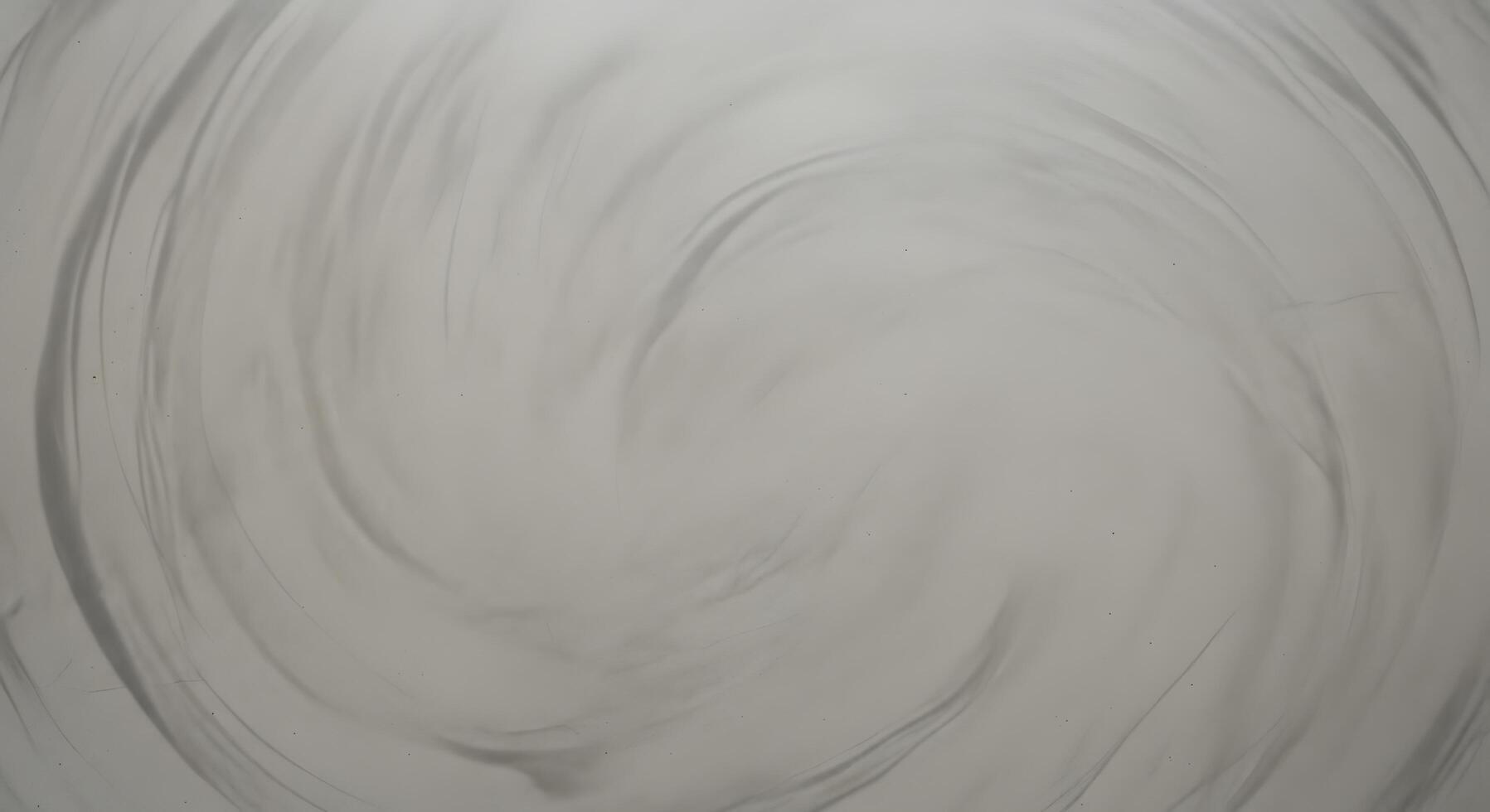 Hypnotic monochromatic vortex of fluid grays, creating a captivating and serene abstract texture perfect for elegant and minimalist design backdrops and overlays photo
