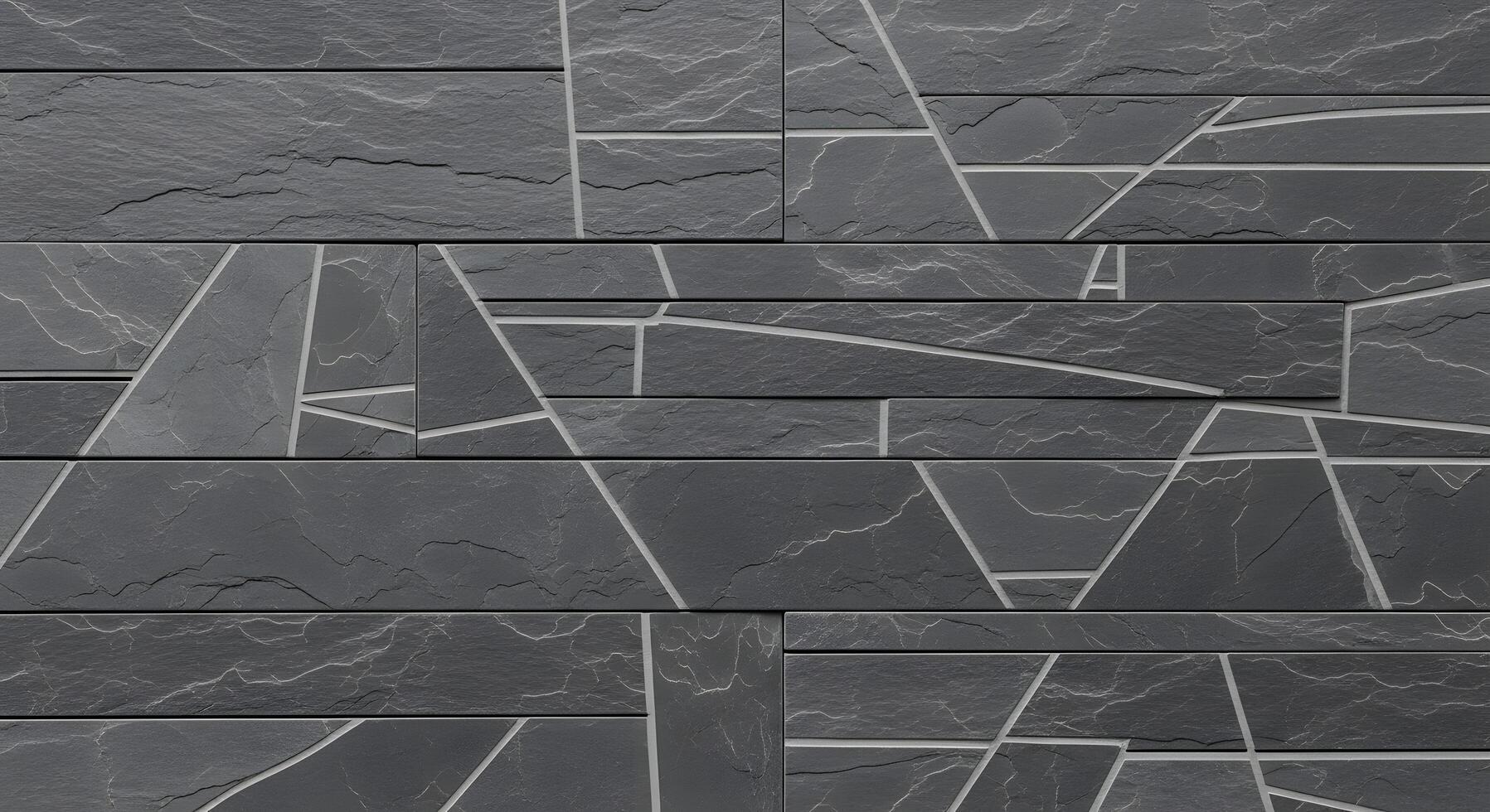 Modern architectural wall cladding featuring dark gray textured stone tiles adorned with intricate abstract geometric patterns in light lines, creating a contemporary and elegant surface design photo