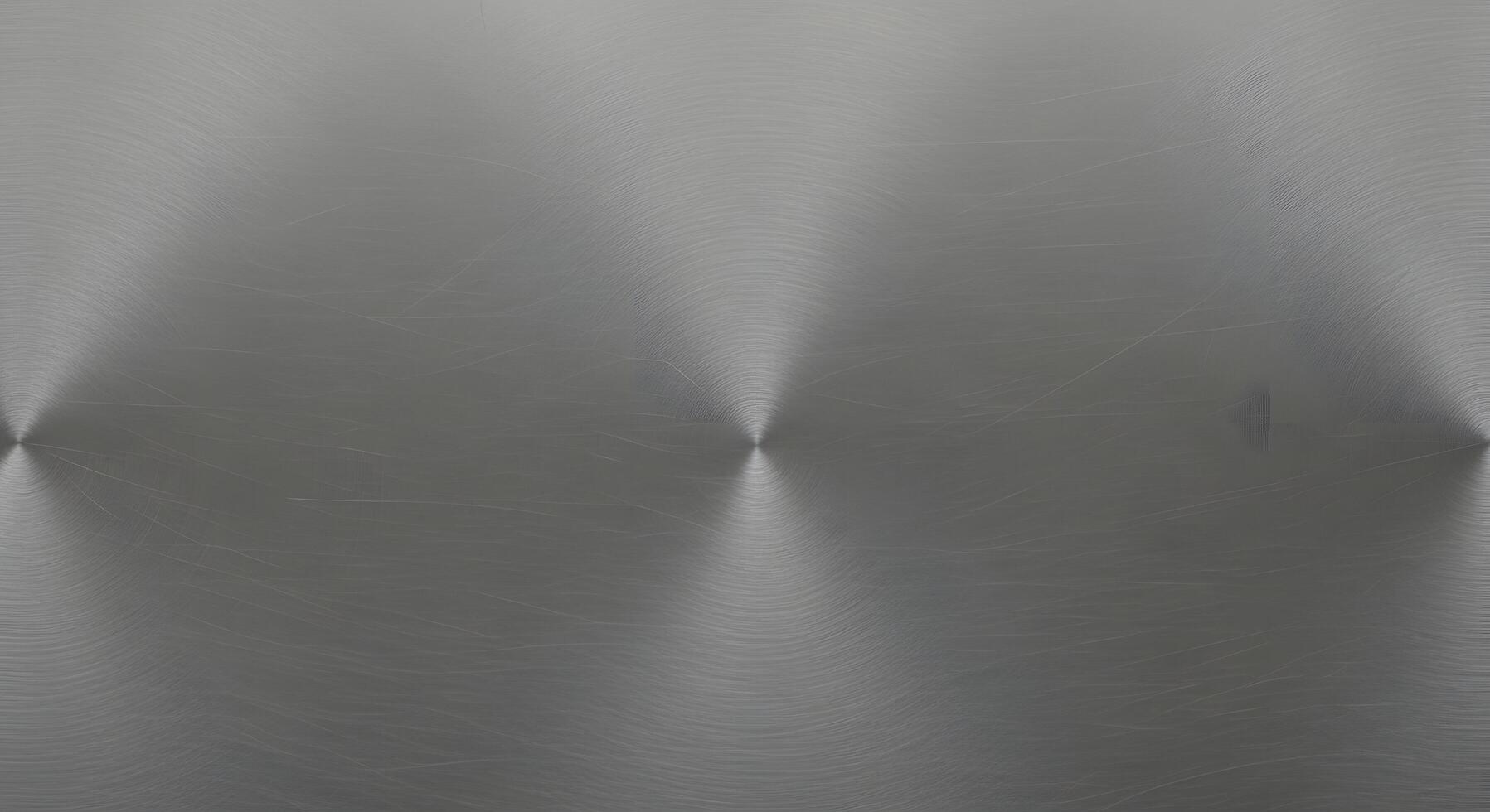 Abstract brushed metal texture with circular patterns and light reflections, perfect for backgrounds and design elements photo