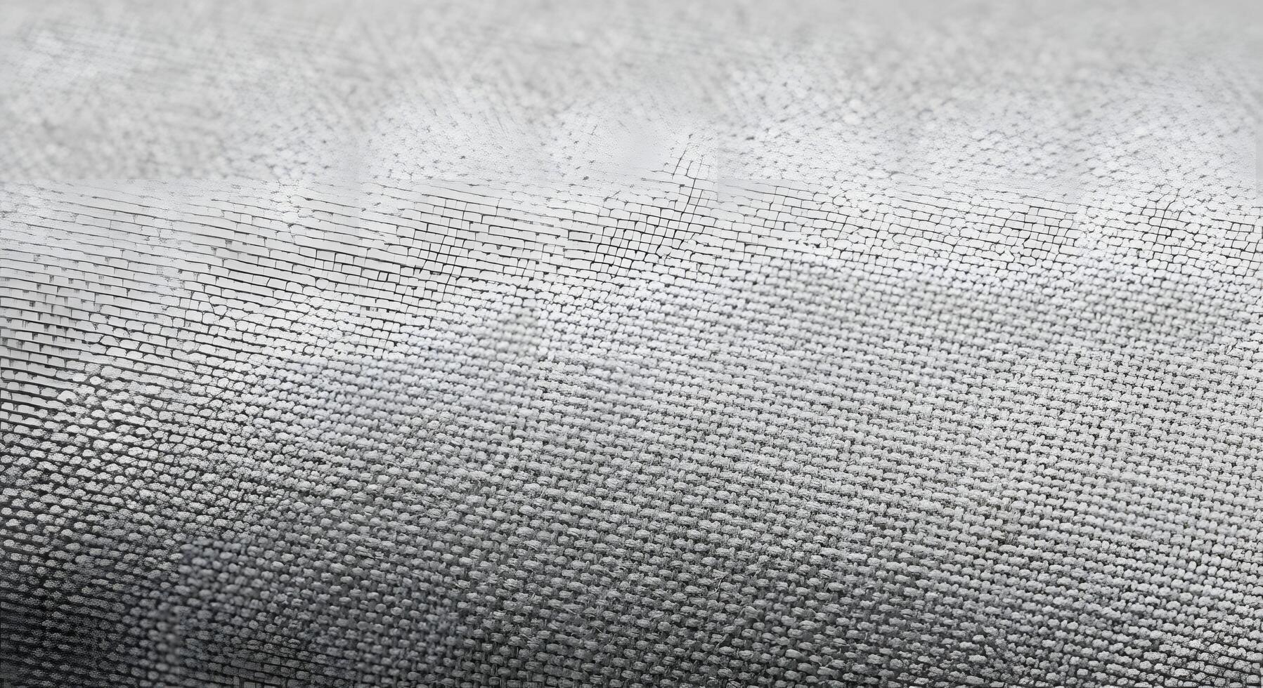 Close-up view of a sophisticated light grey fabric texture, featuring an intricate woven pattern that creates a modern abstract background for elegant design projects photo