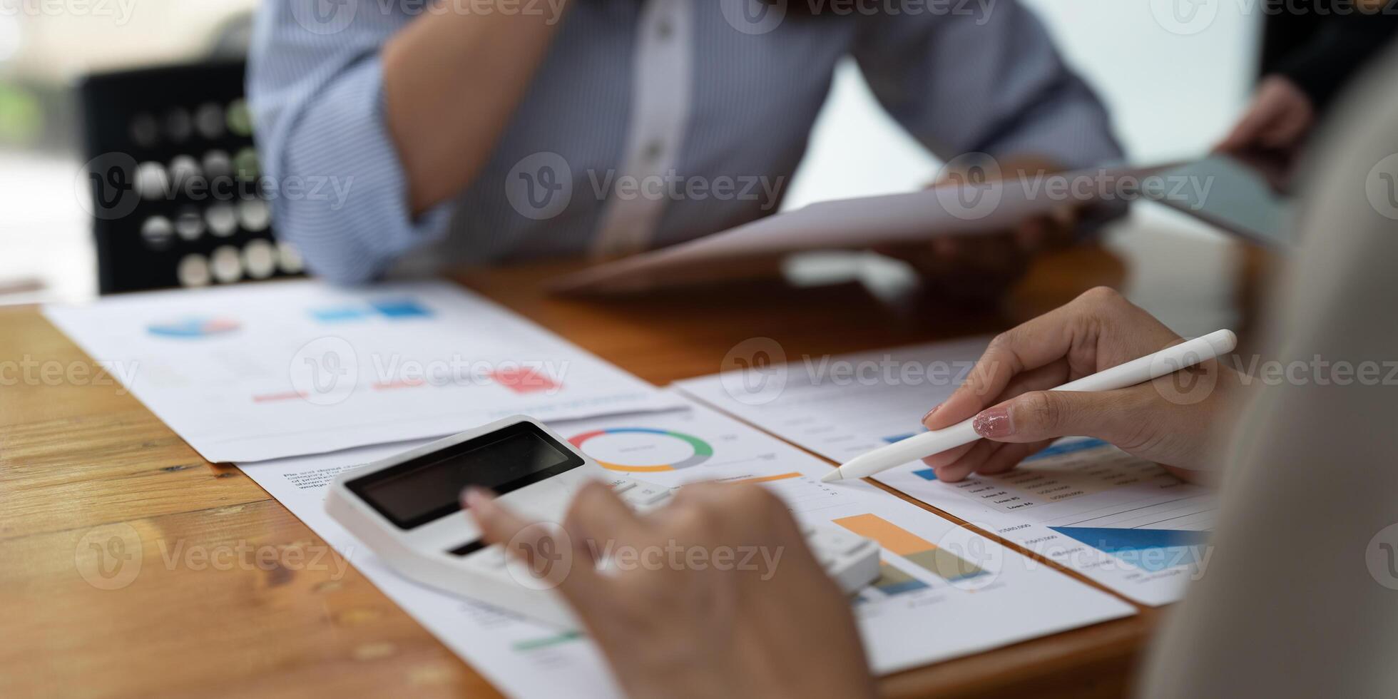 Business People Discussing with coworker planning analyzing financial document data charts and graphs in Meeting and successful teamwork Concept photo