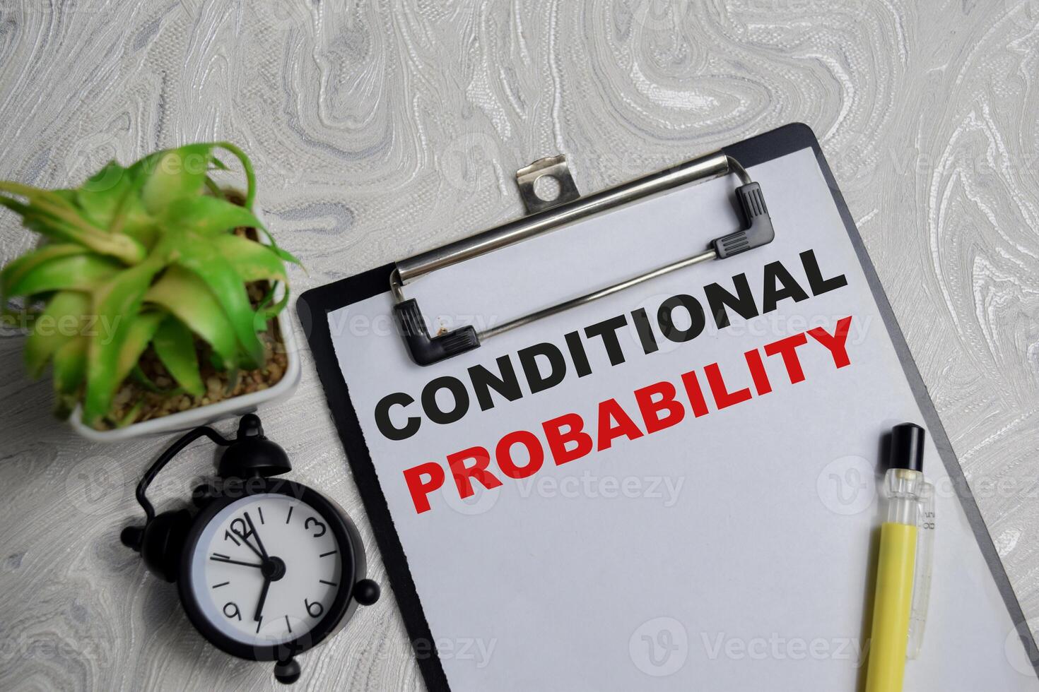 Concept of conditional probability write on clipboard isolated on Wooden Table. photo