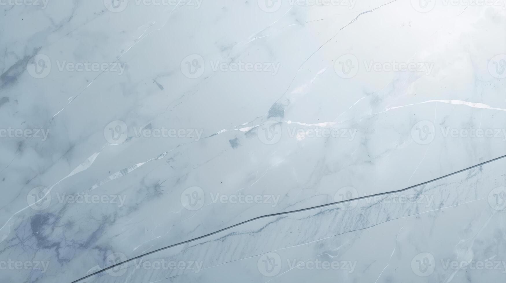 The cool toned light blue marble texture displays unique veining patterns perfect for backgrounds and design work in various creative projects. photo