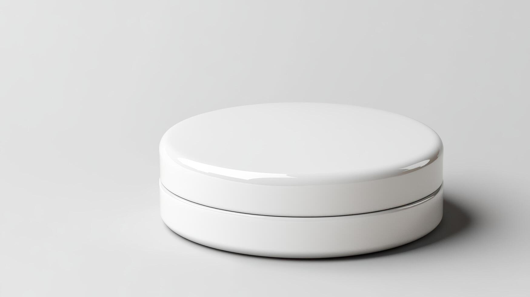 A white container with two lids on a plain surface photo