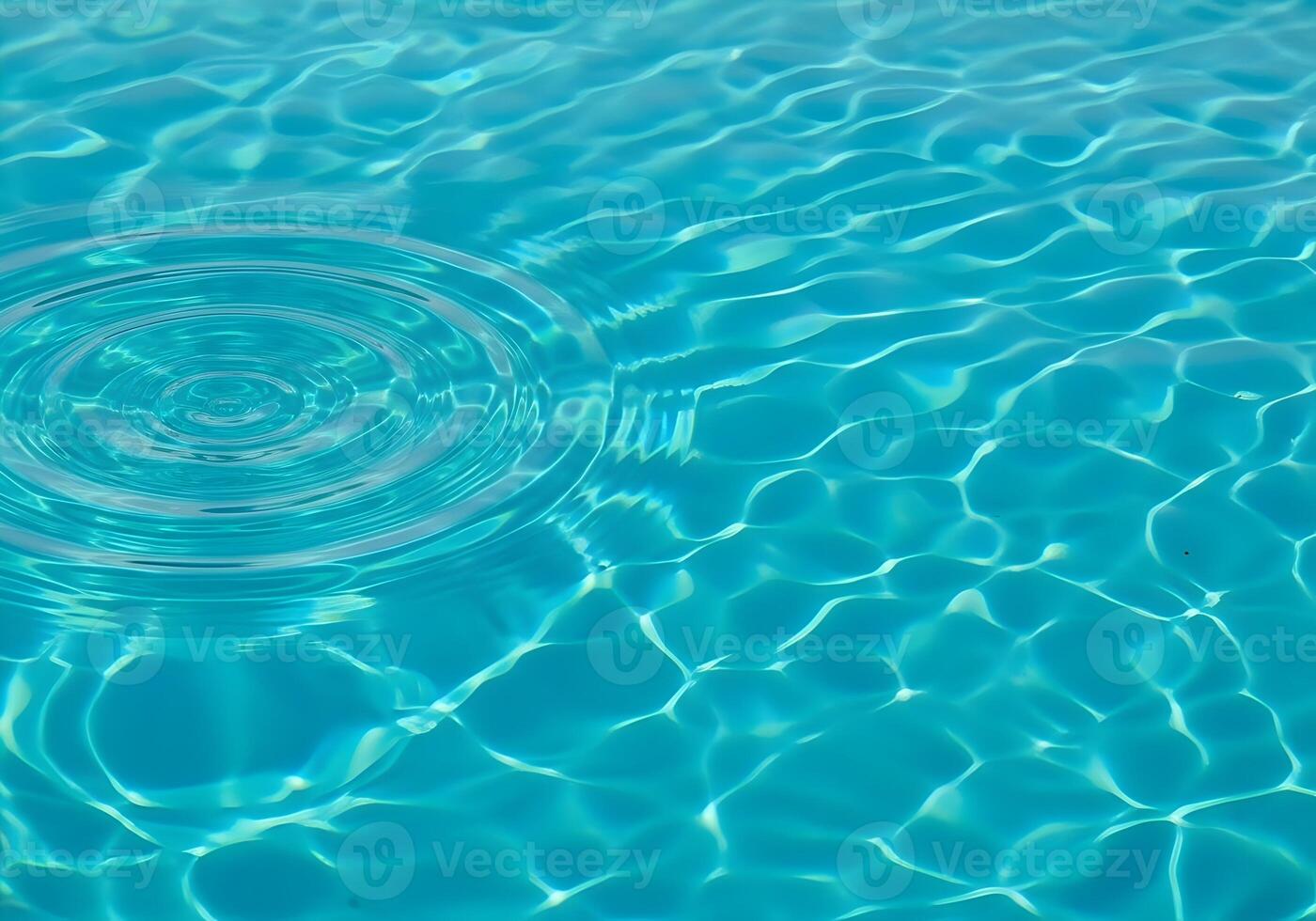 Crystal Clear Water Ripple Effect Creating Serene Reflections of Light and Shadow for a Relaxing and Refreshing Visual Experience Perfect for Water Related Themes photo
