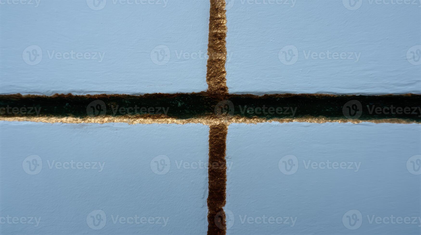 Unique patterns on a painted wall with distinct lines photo