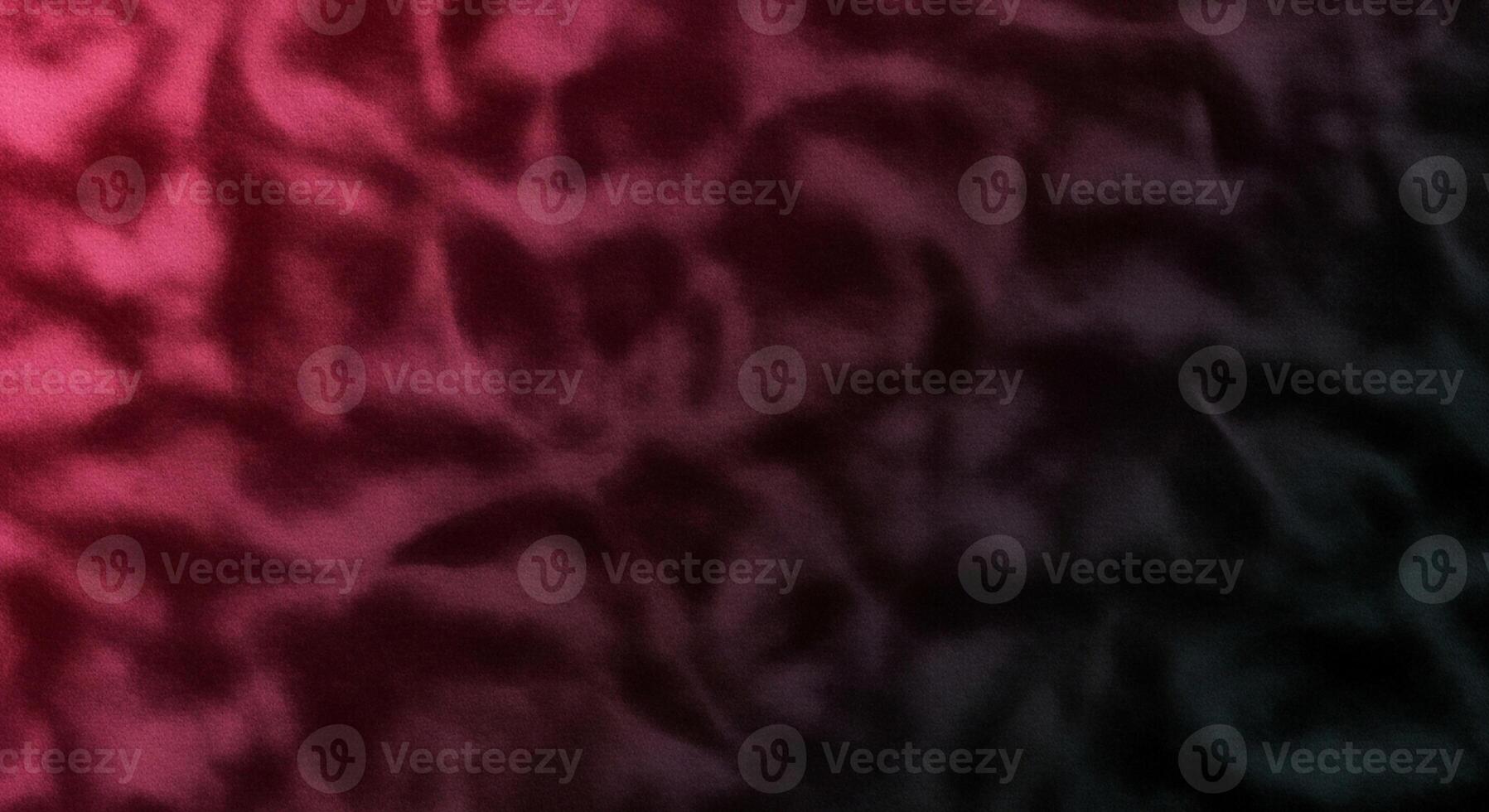 Abstract gradient of deep crimson and dark magenta with subtle textured patterns creating a moody atmospheric backdrop photo