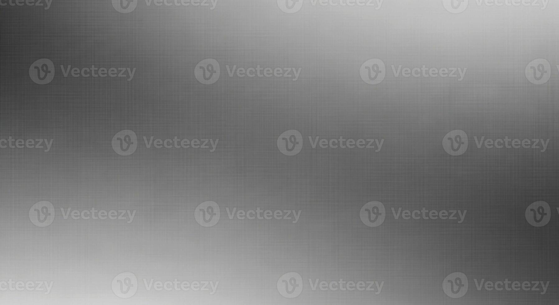 Abstract grayscale gradient background with subtle pixelated texture and soft light diffusion effect photo