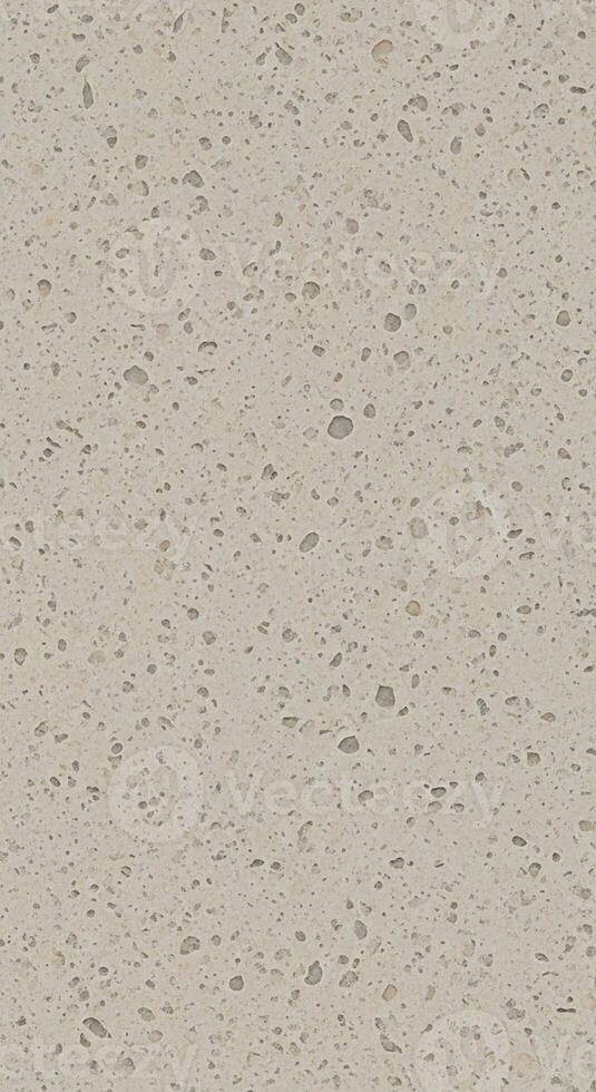 Subtle speckled pattern of light beige and tan with irregular darker flecks creating a textured background photo
