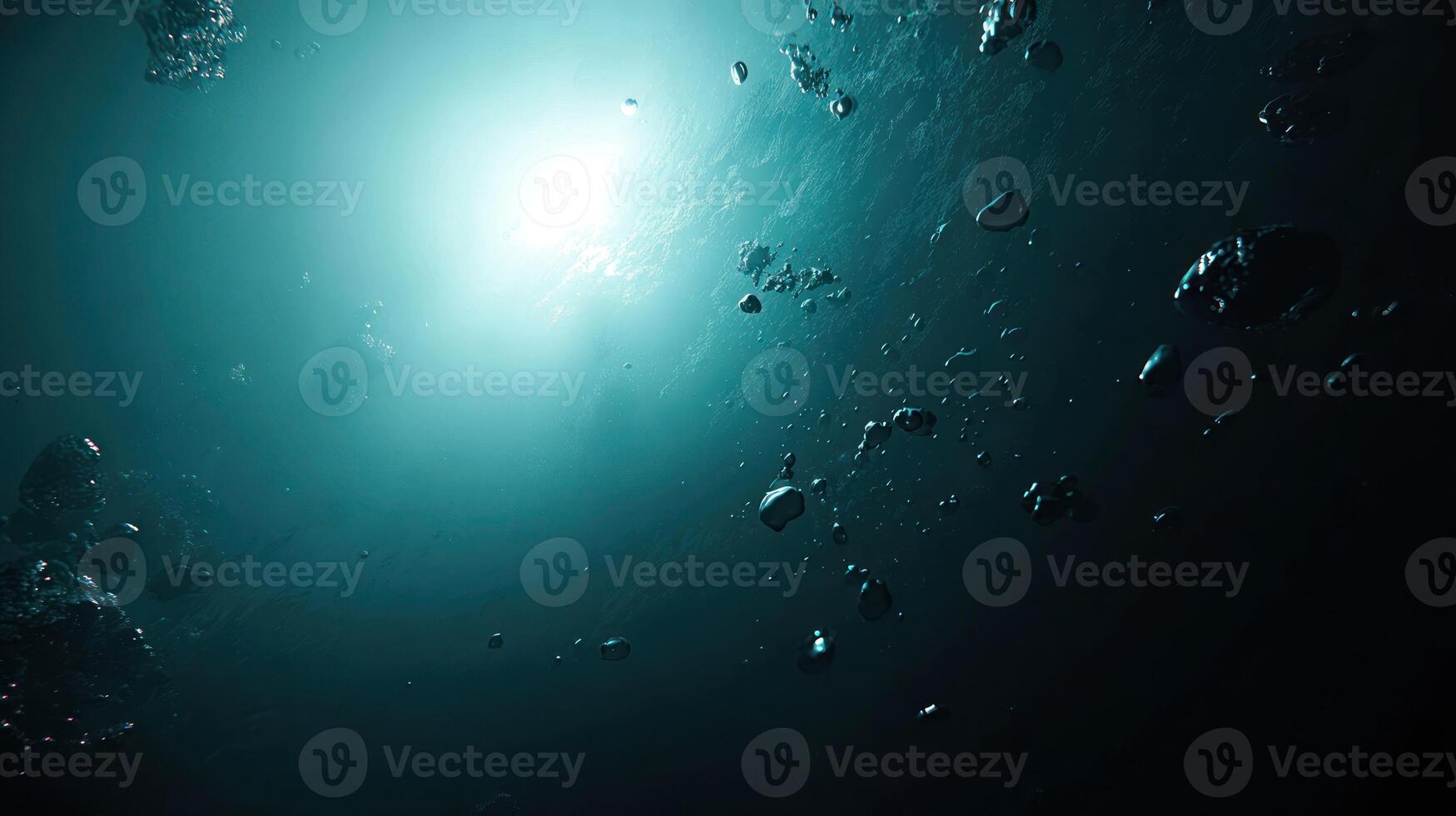 Underwater scene with light rays and bubbles illustrating depth and space photo