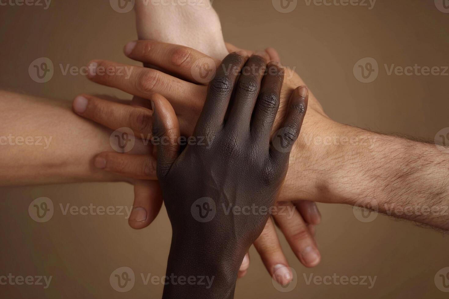 Diverse hands connect in unity and support during a collaborative activity photo