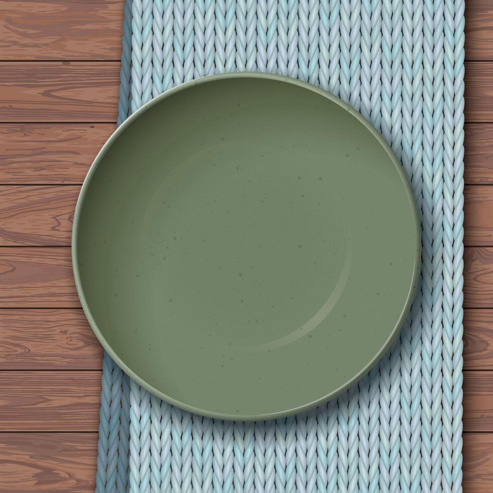 Top view of empty green bowl with grainy texture placed on a light blue placemat on a wooden table vector