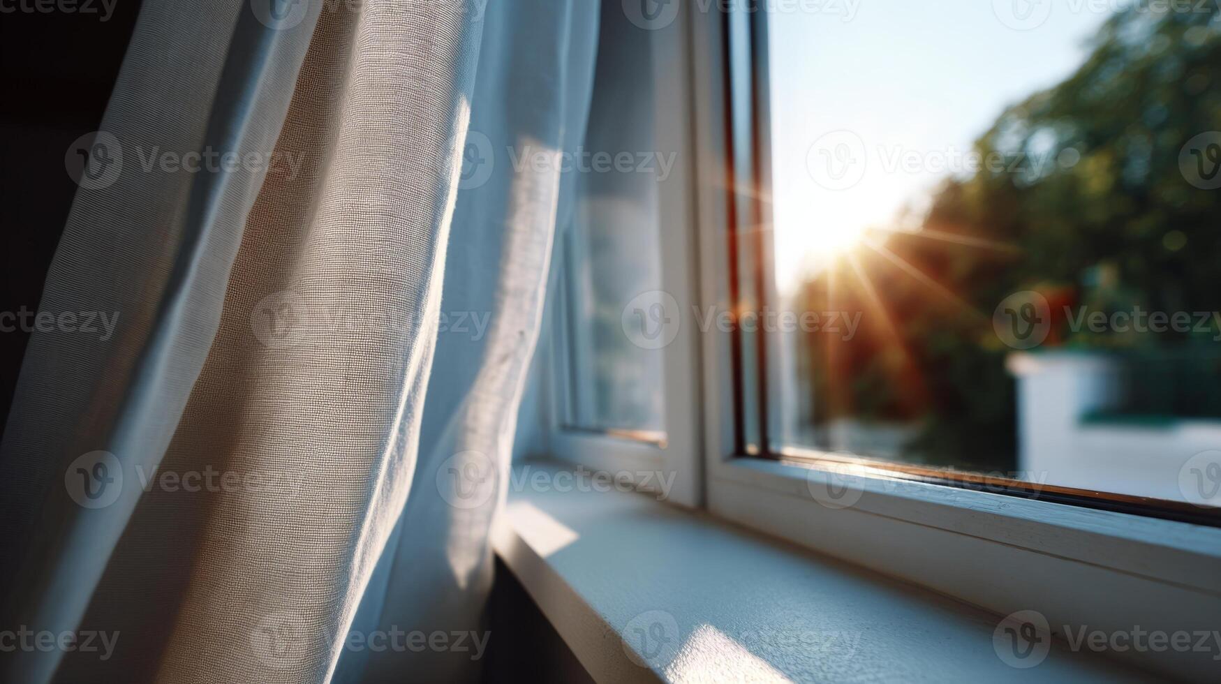 A serene view through a window, showcasing sunlight streaming in, illuminating soft white curtains. photo