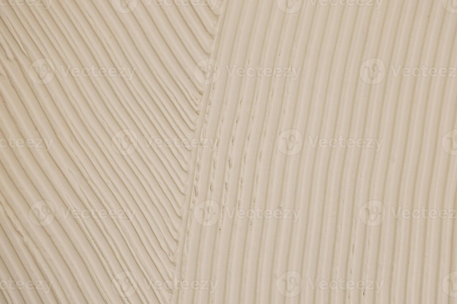 Patterned texture on a wall showing lines and curves created by design elements photo