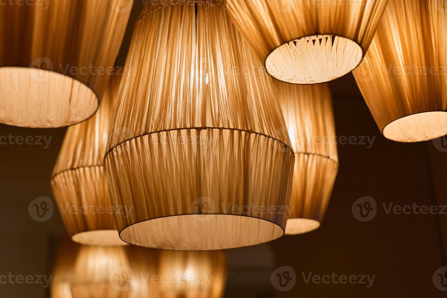 areas softly lit using diverse materials create friendly and inviting settings for various enterprises photo