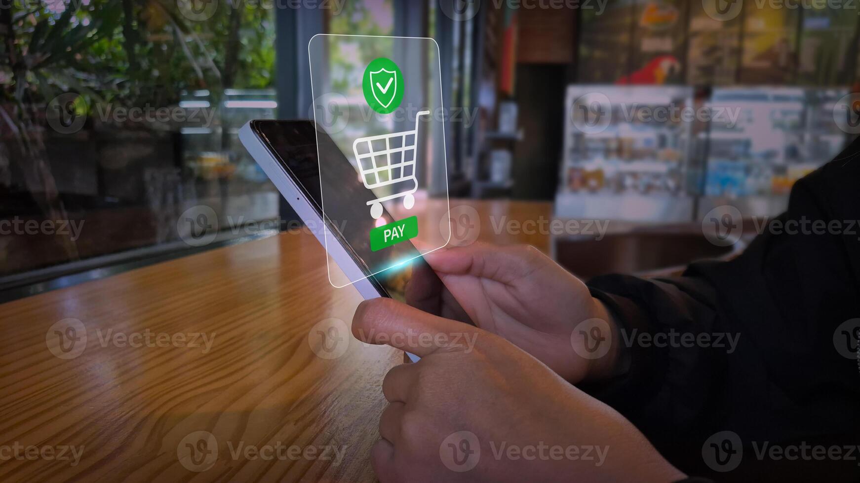 Secure Mobile Payment in Retail Setting with Green Shield and Cart Icons photo