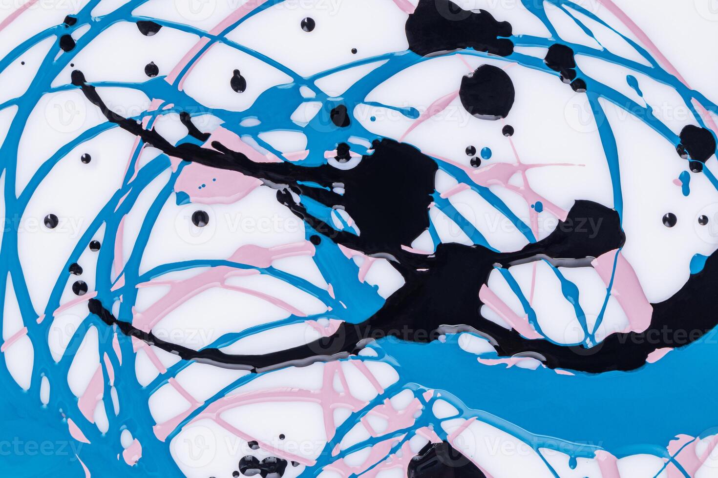 Beautiful acrylic paint pattern in three colors. Smooth lines of circles in a chaotic order. different drops of paint. Abstract modern art background. photo