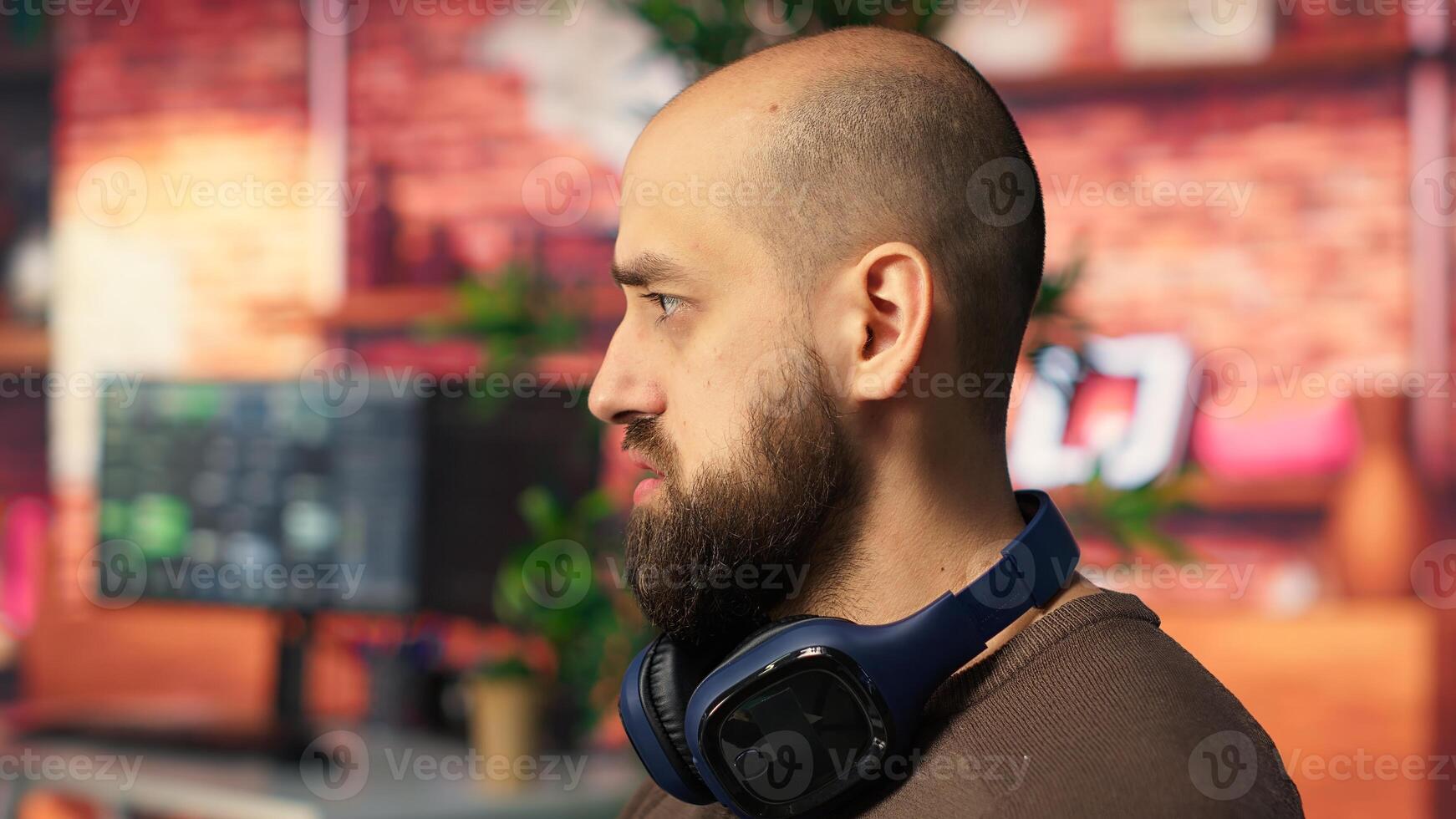 Creative couple working together on editing software for movie making, using AI powered models and prompts to create the perfect montage. Editors team in post production. Camera B. photo