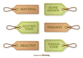 Vector de etiquetas con textura que indica los alimentos orgánicos