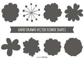 Formas de flores dibujadas a mano vector