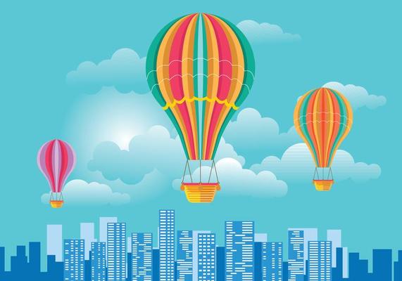 Colorful Hot Air Balloon and Clouds over Skyline Vector