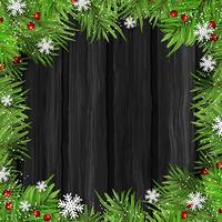 Christmas tree branches on wood background vector