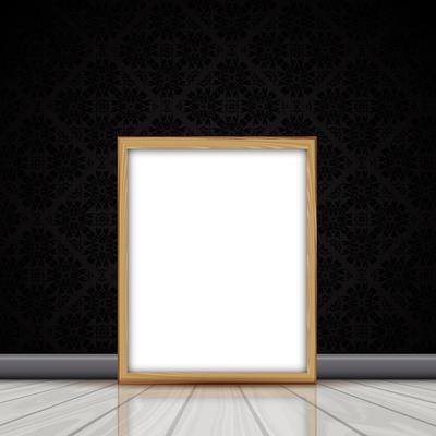 Blank picture with wooden frame leaning against wall