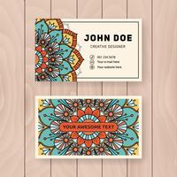 Creative useful business name card design. Vintage colored Manda vector