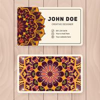 Creative useful business name card design. Vintage colored Manda vector