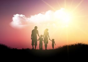 Silueta de una familia caminando contra un cielo al atardecer vector