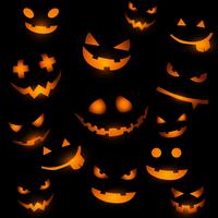 Halloween background with glowing pumpkin faces vector