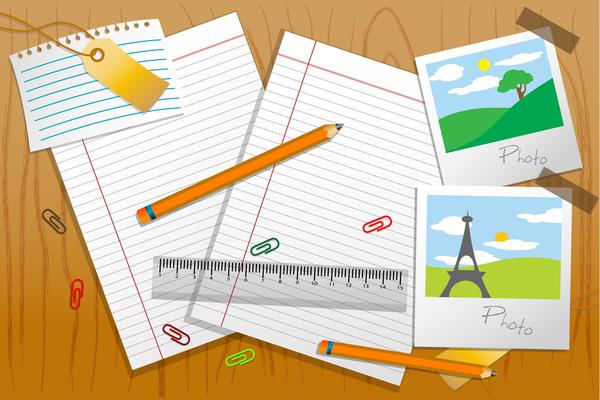 photo with stationary and paper on table