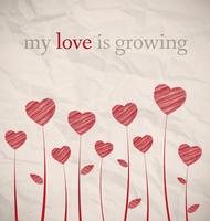 Growing hearts on crumpled paper vector