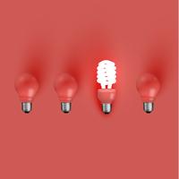 Energy saver lightbulb among old ones, vector illustration