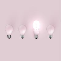 Energy saver lightbulb among old ones, vector illustration